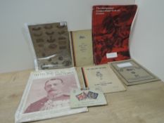 A collection of Military Shoulder Titles, Cap Badges and Ephemera including OTC Lancaster T6 W.