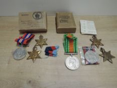 Two WWII Medal Boxes named to Mr G Drew containing 1939-45 Star, War Medal & France and Germany Star