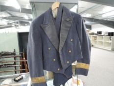 A RAF number 5 mess kit jacket with brevet / waistcoat and trousers along with a pair of RAF Wing