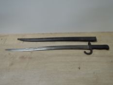 A French Lebel Epee Bayonet, guard numbered 88561, script to top of blade with date 1874, blade