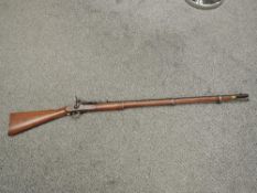 A Snider/Enfield Breach Loading Rifle, butt marked London Armoury 1863, lock plate marked 1862 L.A.