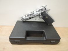 A WE 1911 Single Action Skulls CO2 BB Air Gun, hard case, PURCHASER MUST BE OVER THE AGE OF 18