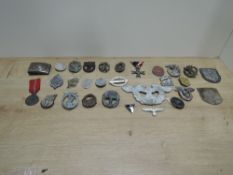 A collection of 28 German Badges and Medals, WWII period and some slightly earlier but post WWI,