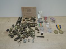 Two WWI Victory Medals, both unnamed, one missing suspension ring along with 4 WWII Medals, 1939-