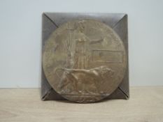 A WWI Bronze Memorial Plaque named to Charles Henry Walker in original card envelope with paper