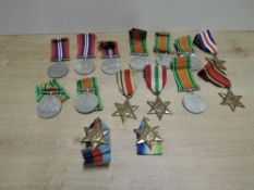 A collection of WWII Medals, War Medal x3, Defence Medal x 6, 1939-45 Star, Africa Star, Burma