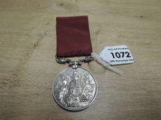 A Queen Victoria Army Long Service And Good Conduct Medal with swivel suspender and ribbon named