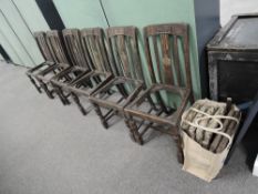 A set of six 1930's oak Dining Chairs having Swastika emblem to back plates and drop in seats
