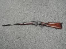 A Spencer model 1865 underlever repeating hammer action Carbine Rifle with pop-up ladder sights,