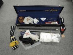 A collection of Masonic Regalia including three full sized Swords, one Cane, five miniature