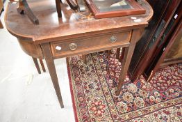 An Edwardian mahogany side table having inlaid decoration, width approx. 91cm