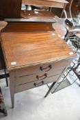 An Edwardian mahogany three drawer music cabinet