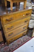 A vintage oak and ply bedroom chest of four long drawers, height approx. 104cm