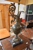 A vintage table lamp modelled as ewer, on slate base