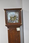 A late 18th or early 19th Century longcase clock having oak case, with 8 day movement , the brass