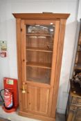 A modern pine bookshelf/display cabinet, height approx. 184 x 76cm