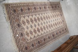 A traditional Persian rug having cream ground, 155 x 100cm