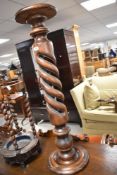 A modern hardwood open twist design jardiniere stand/torchere, height approx. 97cm