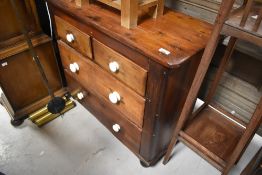 A Victorian stained pine shallow chest of two over two drawers, dimensions approx. W85 D37 H73cm