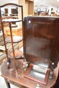 An early 20th Century oak cake stand, a vintage metamorphic firescreen (converts to tea or card