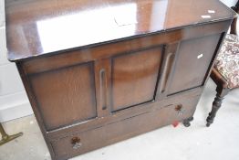 A mid 20th Century oak and ply bedding box, width approx. 91cm