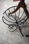 A modern metalwork plant stand