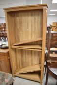 A modern golden oak tall bookshelf, height approx. 201cm