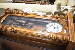 A late 19th or early 20th Century walnut cased Vienna style wall clock
