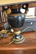 A Grecian style over painted table lamp, with two matching shades