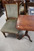 A Victorian mahogany occasional table and an upholstered dining chair