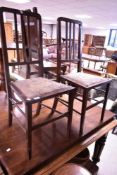 A pair of Edwardian railback bedroom chairs
