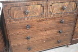 A 19th Century mule chest having lift lid with two faux drawers over three long drawers,