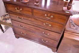 A 19th Century mahogany chest of two over three drawers, having brass drop handles and bracket feet,