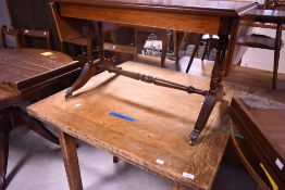 A reproduction Regency coffee table having drop ends, approx. 84 x 42cm
