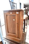 A Victorian golden oak Arts and Crafts style pot cupboard, dimensions approx H66 W40 D38cm