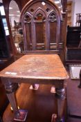 A 19th Century Gothic style hall chair