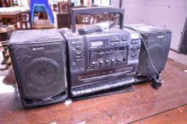 A Sony boom box radio cassette cd player