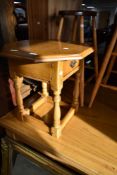 A nice quality golden oak octagonal occasional table with drawer, width approx. 48cm