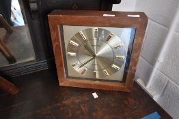 A vintage Toshiba battery powered wall clock, approx. 31 x 31cm