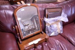 A Victorian mahogany toilet mirror and a later vintage wall mirror
