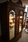 An Edwardian Burr Walnut wardrobe
