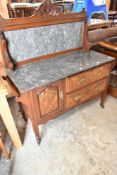 An Edwardian Burr Walnut washstand