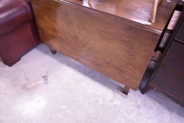 A 19th century mahogany drop-leaf dining table, with square section supports, lacking D-ends 110cm