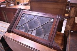 A 19th Century mahogany corner wall display having dentil cornice, astral glazed door and fretwork