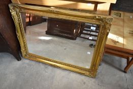 A modern gilt frame foliate wall mirror, approx. 90 x 66cm