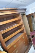 A Victorian stained frame triple wardrobe in the Aesthetic style