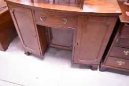 A 19th Century Regency design kneehole desk or dressing table having bow front, width approx. 117cm