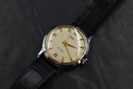 A gent's 1960's Smiths Everest manual wrist watch having Arabic quarter numerals and baton dial with