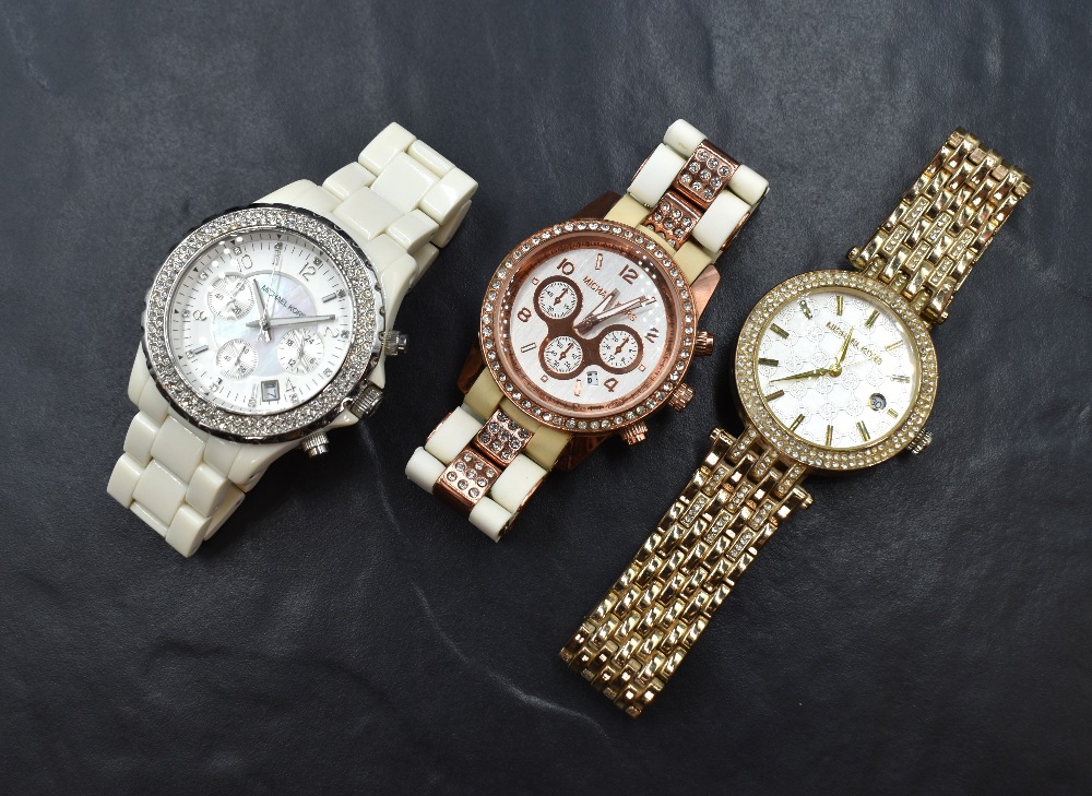 Three Michael Kors wristwatches, comprising one having a white dial, Arabic and square numerals, - Image 2 of 3