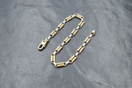 A 9ct white and yellow gold fancy link bracelet with lobster clasp, approx 200mm long & 8.9g